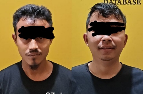 Dua pelaku pencurian galah diamankan Polsek Ukui.(foto: andi/halloriau.com)